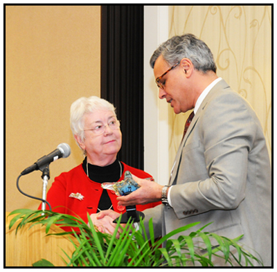 State Health Director Dr. Jeff Engel presents Rachael Stevens with the 2011 Ronald Levine Legacy Award